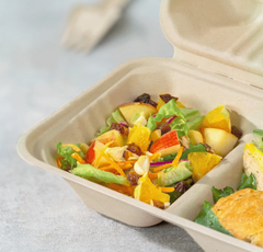 Karat Earth 9'' x 6'' PFAS Free Bagasse Hinged Container, 2-Compartment, Kraft - 200 pcs