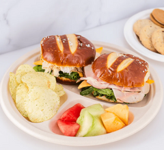 Karat Earth 10'' PFAS Free Compostable Bagasse Round Plates, Natural, 3 Compartments - 500 pcs