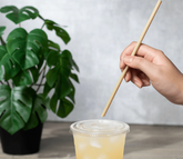 Karat Earth 9" Diagonal Cut Bamboo Fiber Jumbo Straws (6mm) Paper Wrapped, Natural - 4,000 pcs